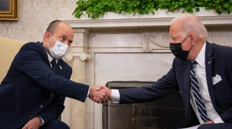Naftali Bennett shakes hands with Joe Biden