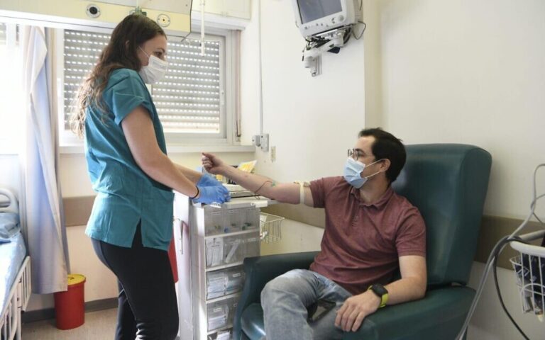 Anar Ottolenghi receives a dose of coronavirus vaccine developed by the Israel Institute for Biological Research at Jerusalem's Hadassah Ein Kerem Hospital, November 1, 2020 (Courtesy)