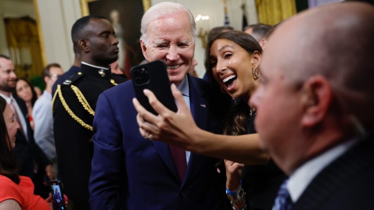 President Joe Biden poses for a selfie at the Jewish American Heritage Month on May 16, 2023.