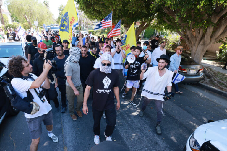 Clashes between pro-Palestinian protesters and Israel supporters spilled over onto residential streets in Pico-Robertson on Sunday.