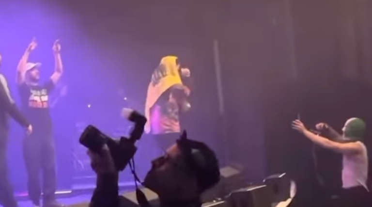 Membre du groupe de rotule chargé de terrorisme pour avoir affiché le drapeau du Hezbollah au concert