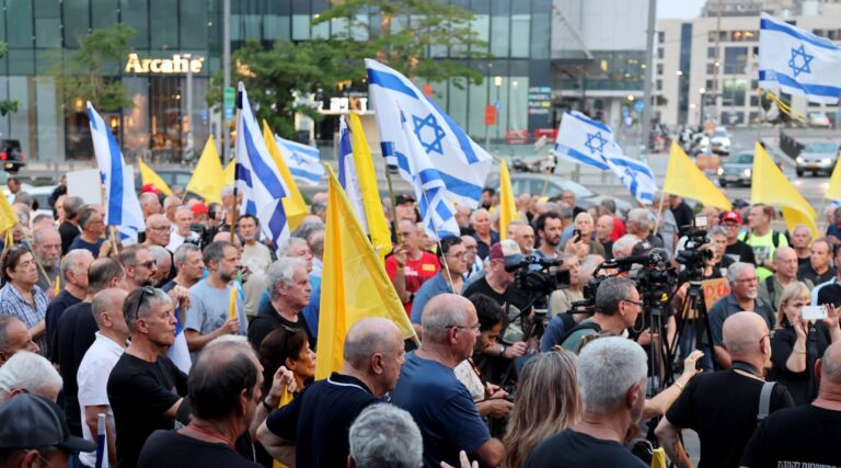 A photo of retired and reserve Israeli Air Force pilots protesting.