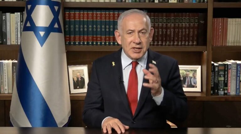 Benjamin Netanyahu at his desk