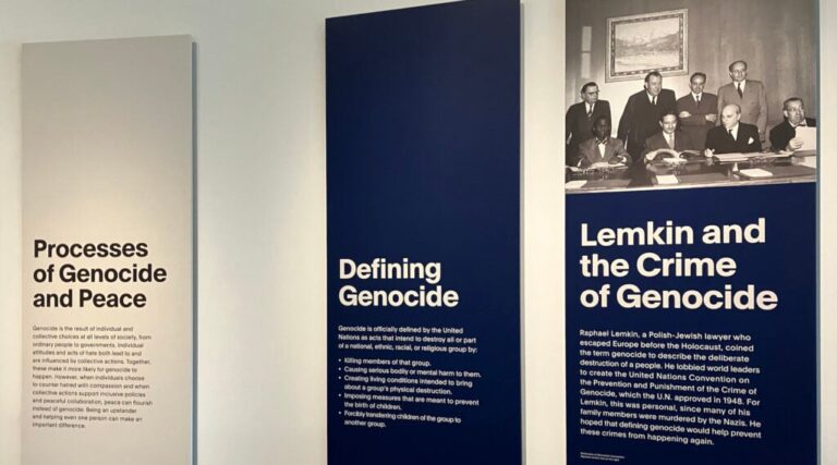 Plaques discussing "genocide" at a Holocaust museum