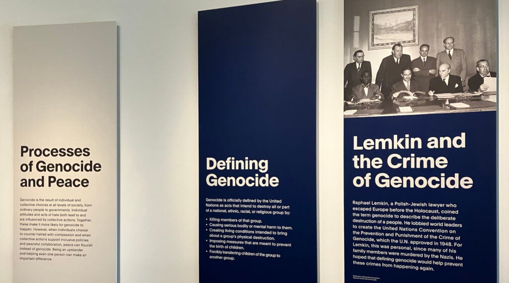 Plaques discussing "genocide" at a Holocaust museum