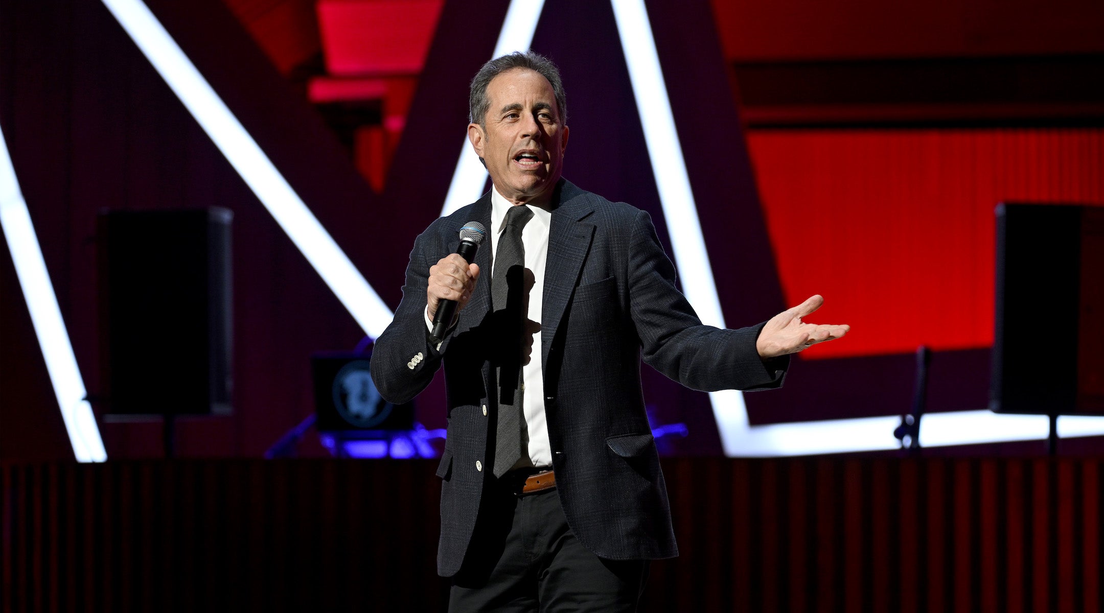 Jerry Seinfeld performing stand-up