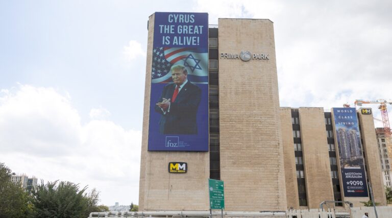 A billboard in Jerusalem compares Donald Trump to Cyrus the Great